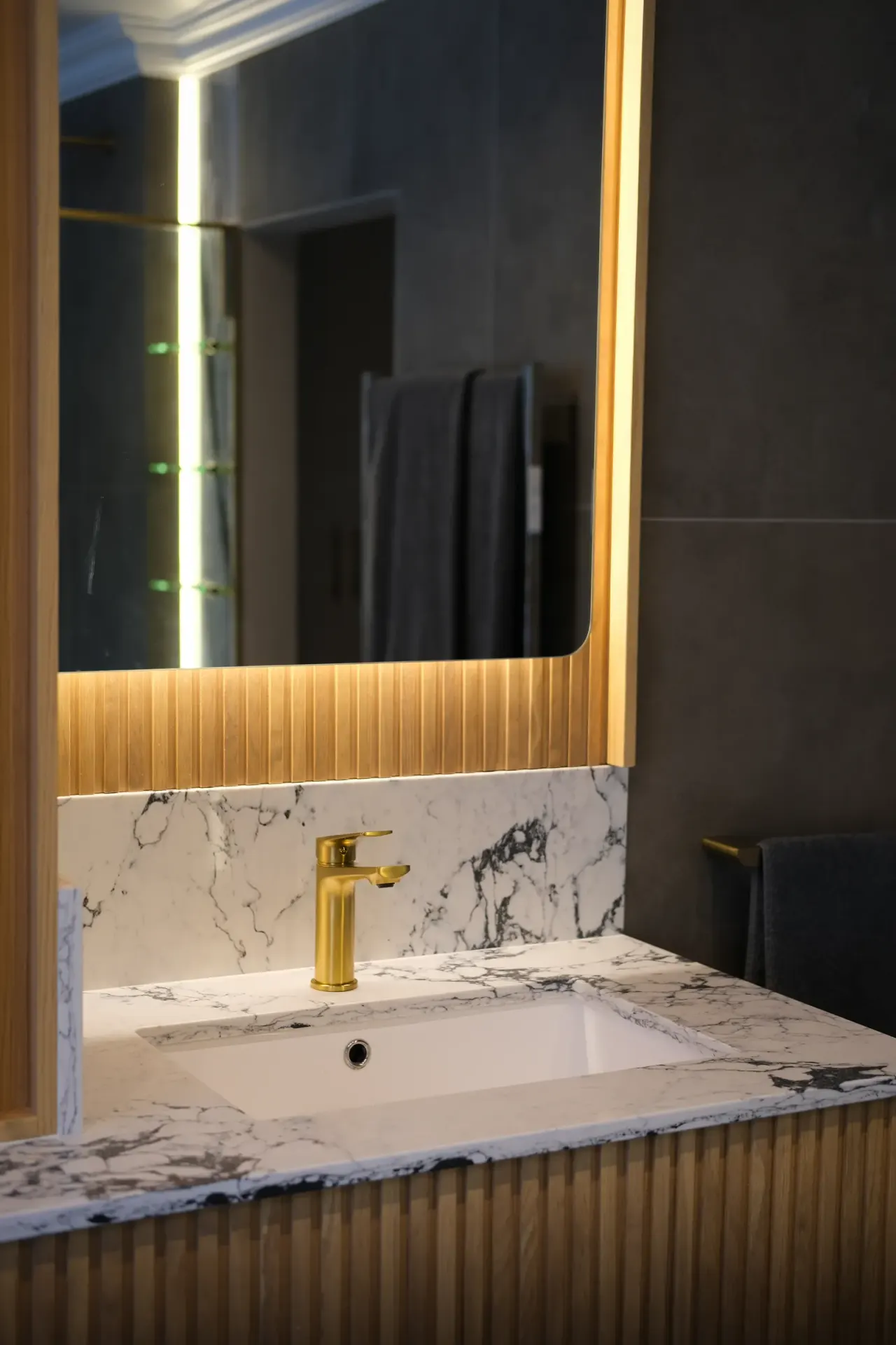Vita satin brass basin mixer in luxury bathroom