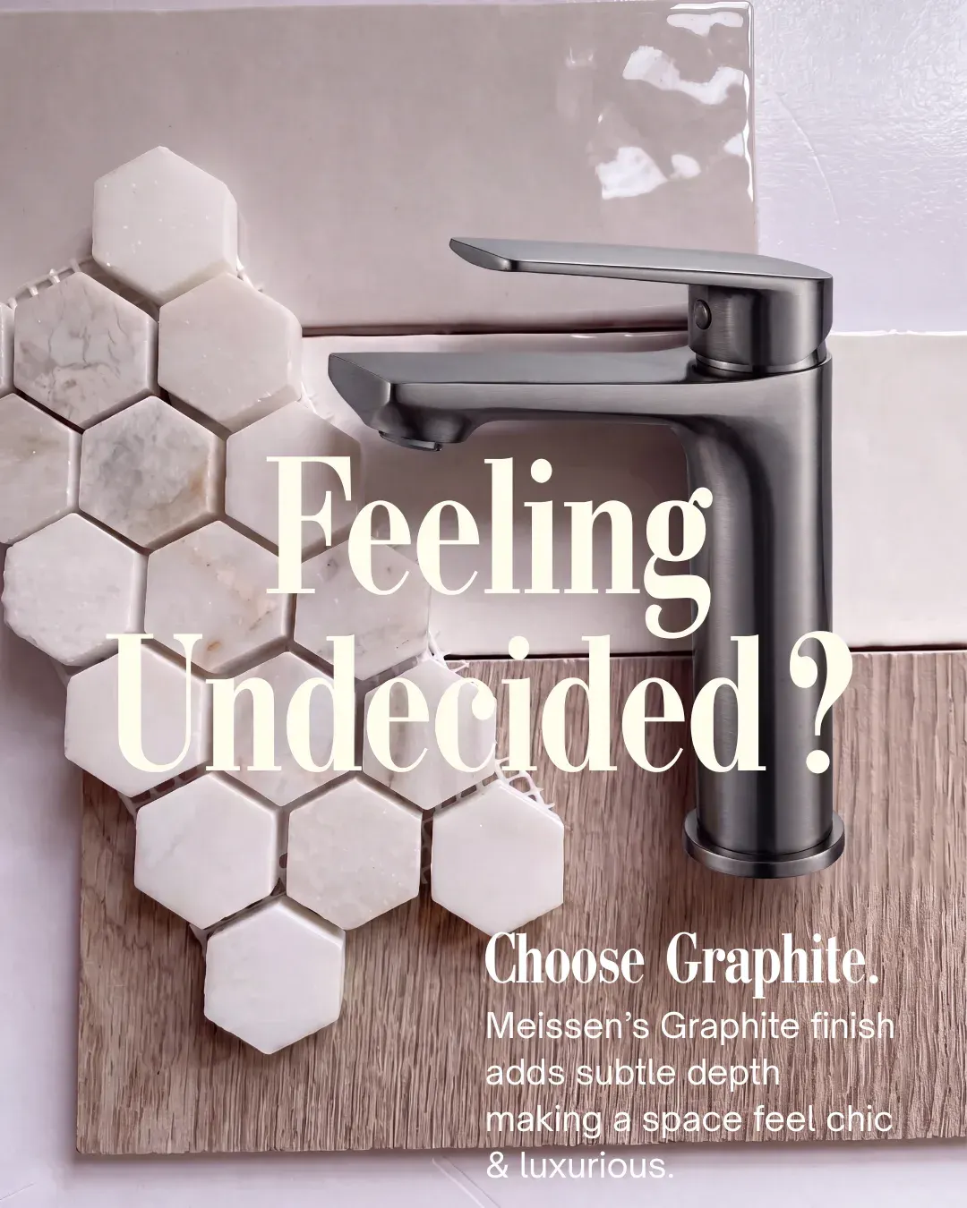 Marble hexagon tile and Graphite basin mixer tap with the text Feeling Undecided? Choose Graphite