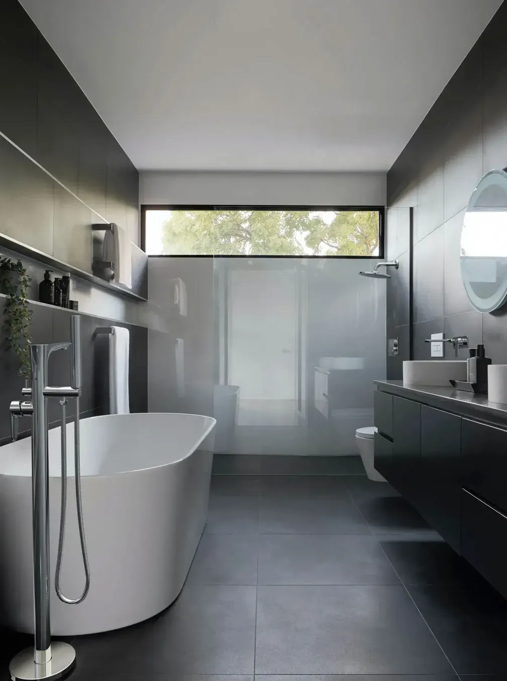 Contemporary Onex Collection tapware and bathroom accessories.